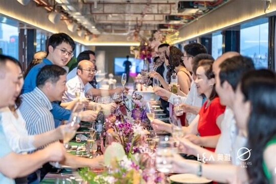 Guests raising a toast at the opening of The Silos